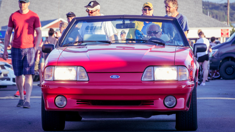 Dartmouth, Nova Scotia, Canada - August 22, 2019 : 1987 to 1993 Ford Mustang convertible at weekly summer A&W Cruise-In at Woodside ferry terminal parking lot.