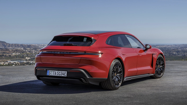 Rear 3/4 view of a red Porsche Taycan GTS Sport Turismo