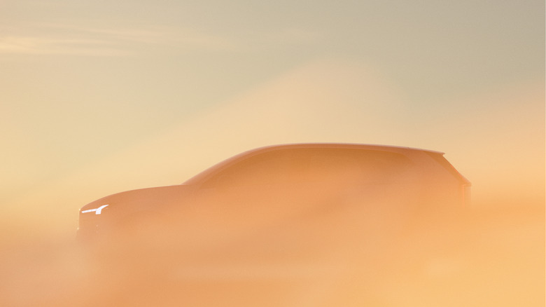 A volvo ex60 in a sandstorm