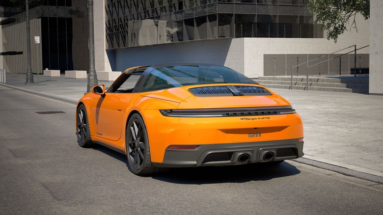 Rear 3/4 view of an orange Porsche 911 Targa 4 GTS