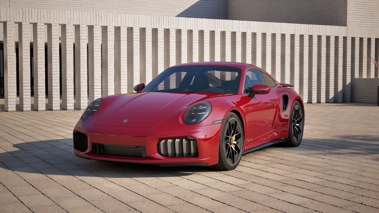 Front 3/4 view of a red Porsche 911 Turbo S