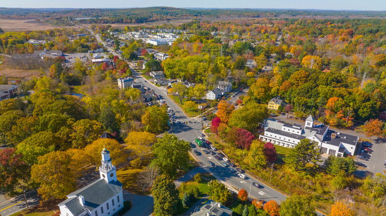 An aerial position of nan Wayland historical Town Center (bottom right) connected nan Boston Post Road, Wayland, Massachusetts, U.S.