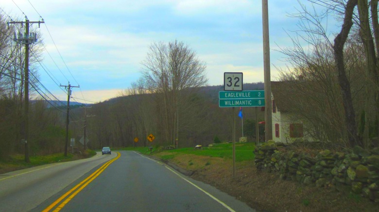 an image of connecticut route 32 with mountains in the background