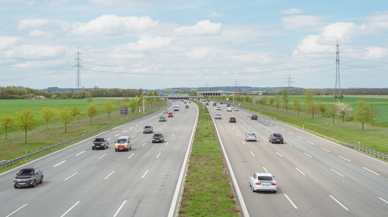 a stretch of the german autobahn with traffic flowing in both directions