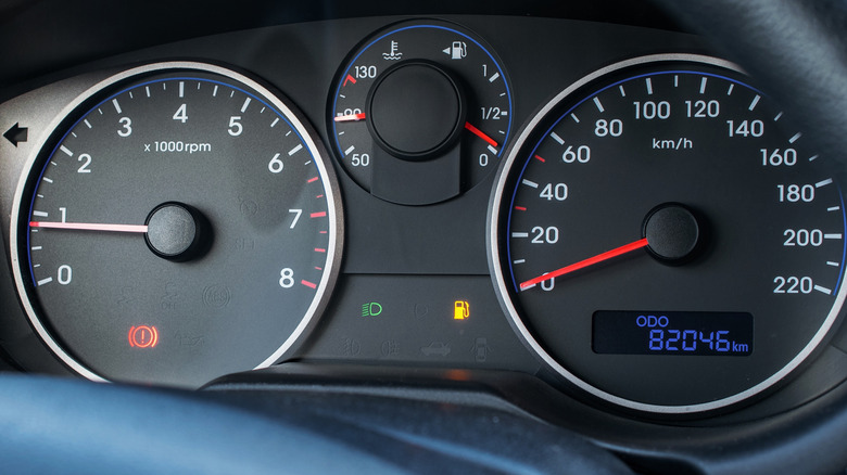 Fuel car gauge empty. Petrol tank meter car indicator on dashboard. Low gasoline level. Empty fuel gas gauge