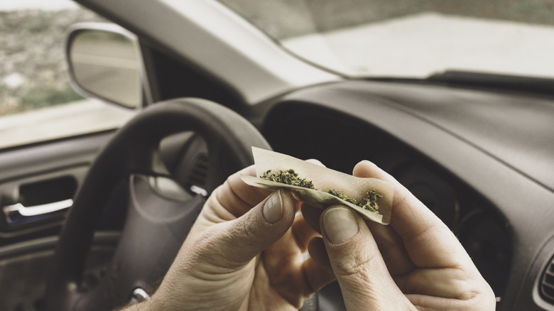 Travel, road trip and black people couple driving by countryside for holiday, journey and freedom with happiness. Trendy sunglasses, fashion and gen z friends in a car drive for vacation lifestyle