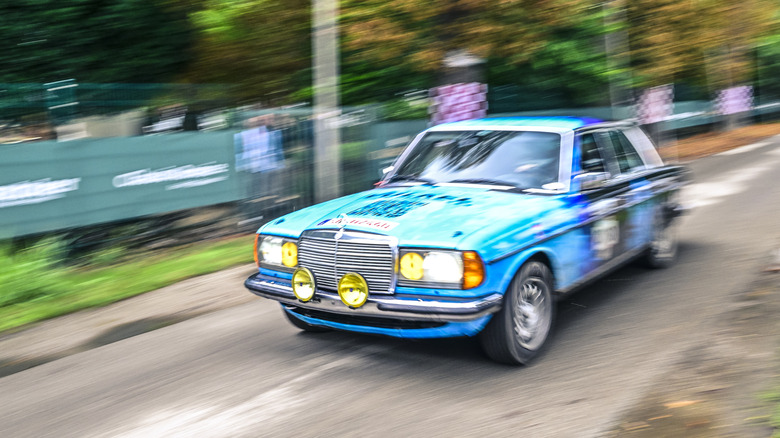 KORSCHENBROICH, GERMANY - AUGUST 2: Mercedes-Benz 450SE W116 S-Class rally car performing a demonstration drive during the Classic Days 2025 Grand Meeting event on the Rittergut Birkhof, on August 2, 2025 in Korschenbroich-Lüttenglehn, Germany.
