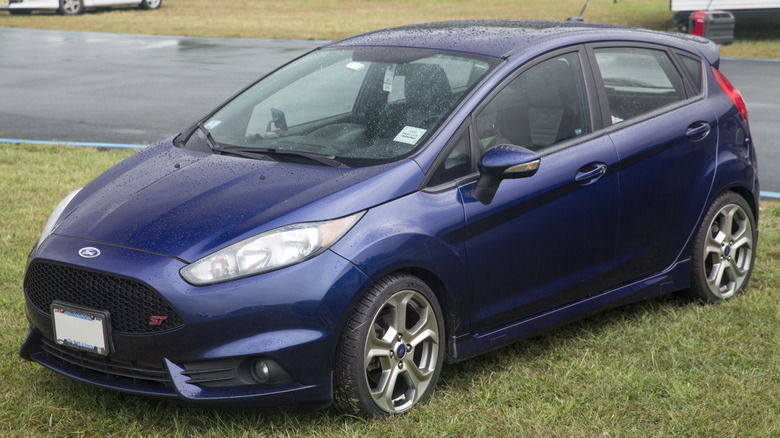 2016 Ford Fiesta ST in the parking lot at the 2021 Lime Rock Historic Festival. Painted Kona Blue, built in Cuautitlan, Mexico.