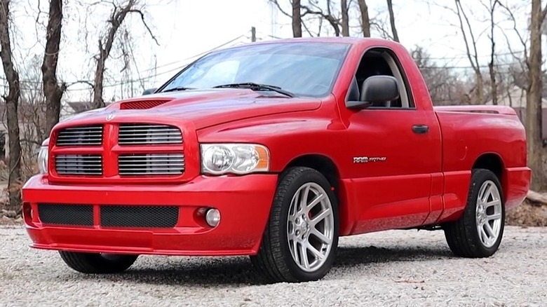 A front-left 3/4 static shot of a red 2004 Dodge Ram regular cab SRT-10