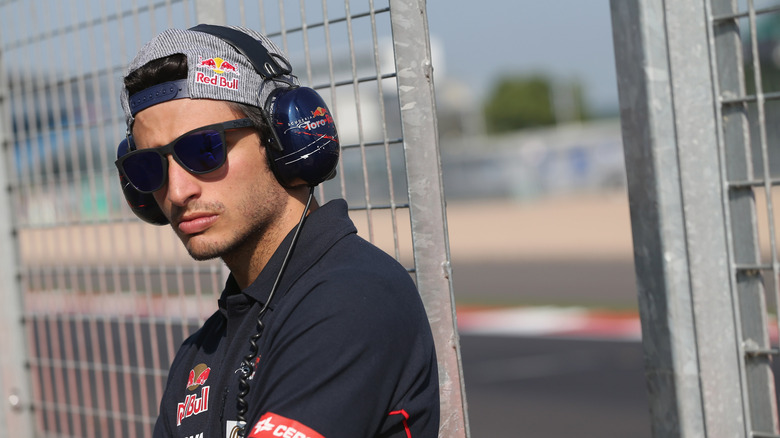Carlos Sainz Jr in the pit lane during Formula testing at Silverstone Circuit on July 17, 2013 in Northampton, England