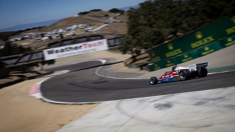 A race car going down the corkscrew at Laguna Seca