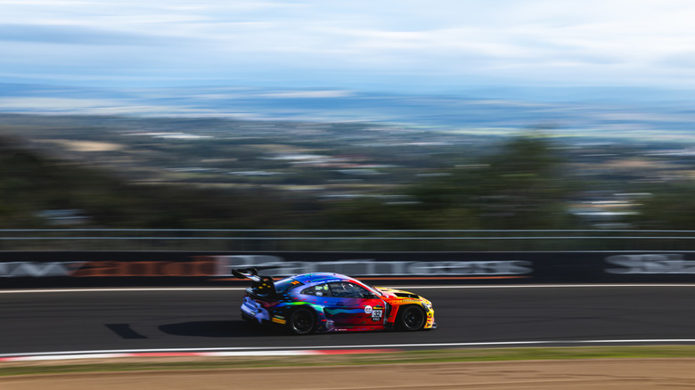 A race car driving on Mount Panorama
