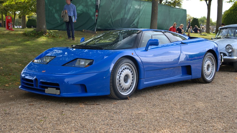 A blue 1992 Bugatti EB110 GT taken at the Hampton Court Concours 2025.