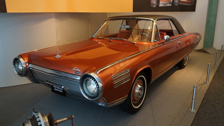 An orange 1963 Chrysler Turbine Coupe on display at the Walter P. Chrysler Museum