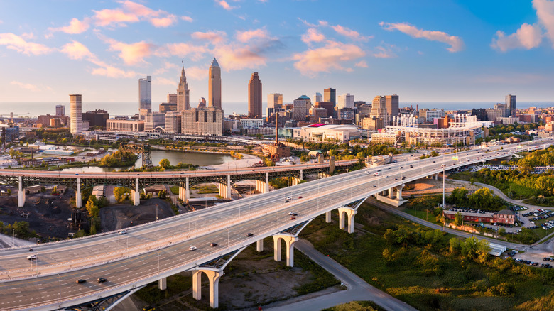 Aerial view of Cleveland, Ohio skyline and I90 interstate highway at sunset. Cleveland is a major city in the U.S. state of Ohio and the county seat of Cuyahoga County.