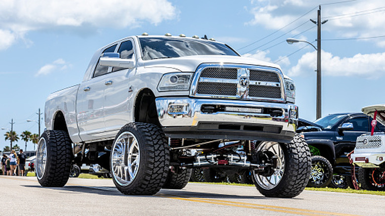 Large lifted achromatic ram ram truck