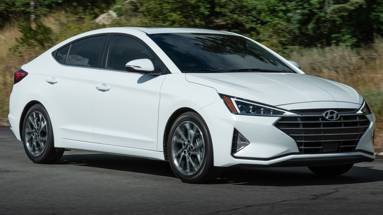 A 3/4 front view of a white 2020 Hyundai Elantra