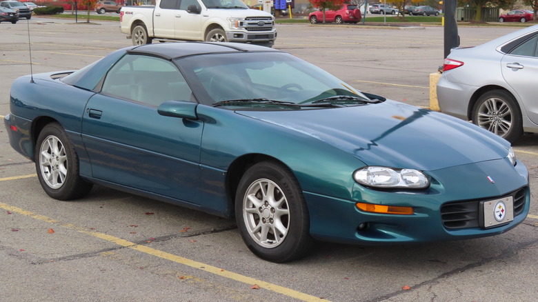 A teal 2000 Chevrolet Camaro coupe photographed in New Castle, Pennsylvania.