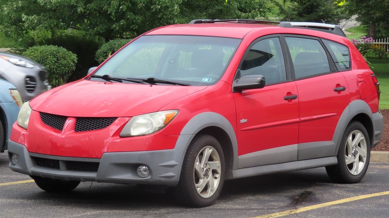 A red 2003-2004 Pontiac Vibe photographed in New Castle, Pennsylvania.