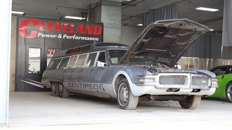 A grey Jetway 707 Airport Limousine inside a garage
