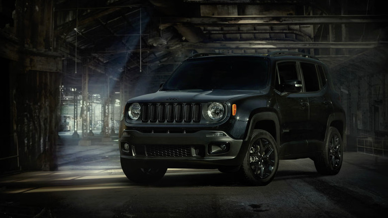 A yellow Jeep renegade parked inside
