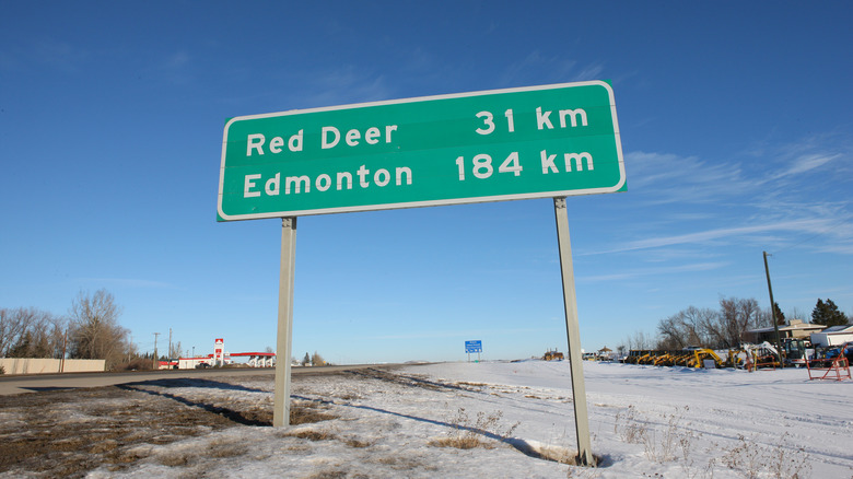 A road sign along Highway 2 in rural Alberta, a short distance north of Calgary, shows the distances to Red Deer and Edmonton on January 20, 2009 in Edmonton, Alberta.