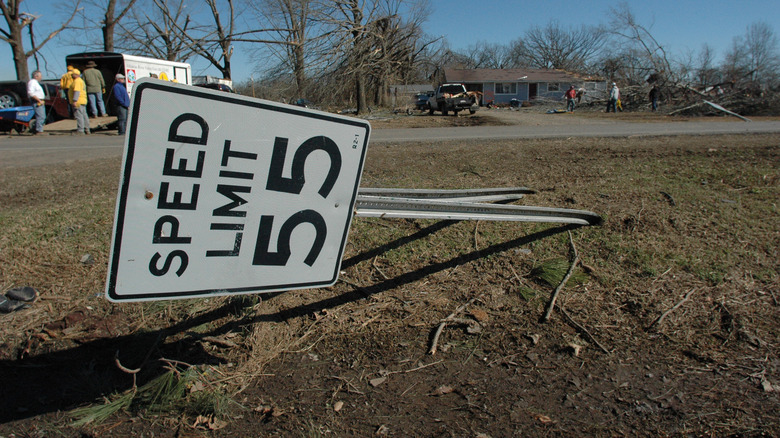 This Highway sign was bent by a tornado which swept across Arkansas