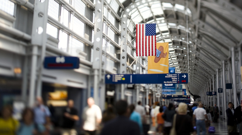 People crowded in a airport terminal