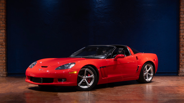 Minas Gerais, Brazil - 17 05 2025: Red Chevrolet Corvette C6 in a professional studio, American sports car front quarter view