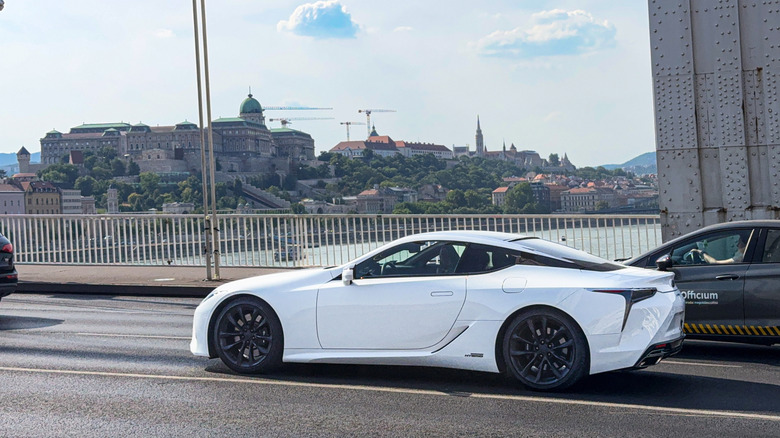 Budapest, Hungary - 6th July 2025: View on a white Lexus LC 500H driving on a bridge in Downtown Budapest.