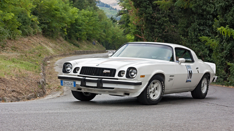 Predappio, FC, Italy - July 21, 2012: vintage Chevrolet Camaro Z28 in hairpin bend at uphill race rally Predappio legend 2012, historical italian uphill race