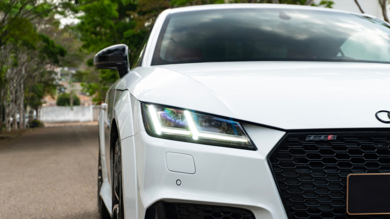 Minas Gerais, Brazil - 29 10 2025: White Audi TT RS headlight detail, Modern sports coupe closeup