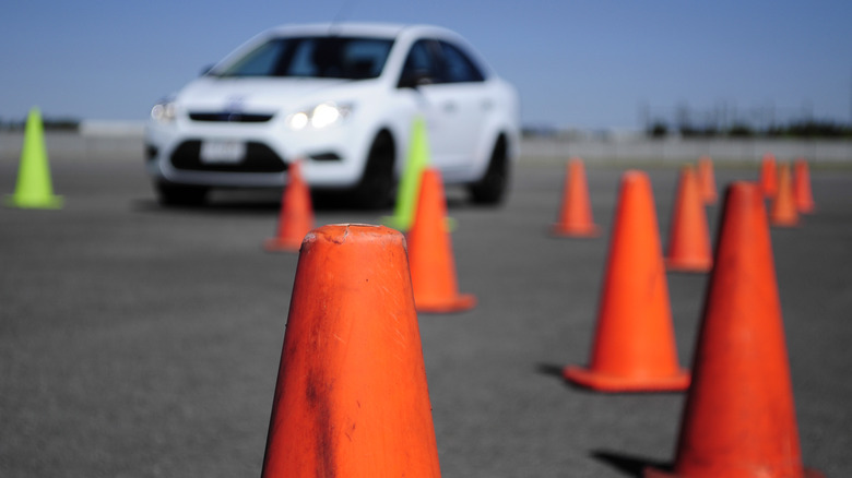 Driver training school with orange cones