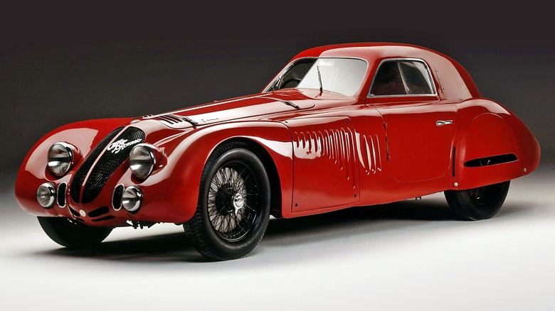 Front 3/4 view of a red 1938 Alfa Romeo 8C 2900 Le Mans
