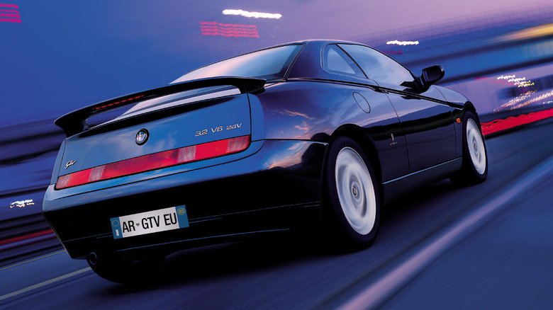 Rear 3/4 view of a blue Alfa Romeo GTV