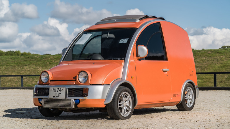 Orange Nissan S-Cargo