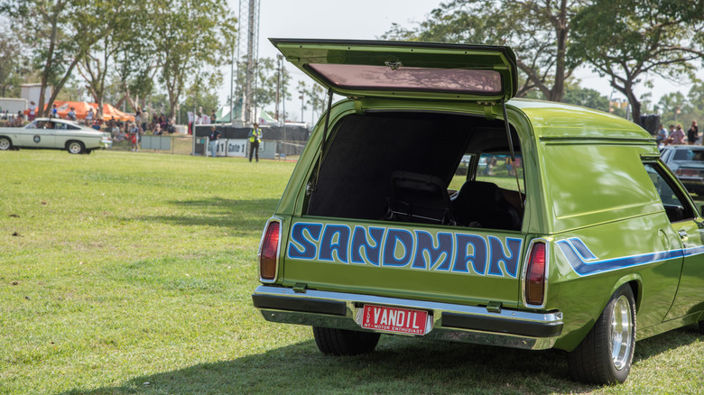 Darwin, NT, Australia- July 27,2018: Automobile procession with a Holden Sandman panel van ute at the Darwin show at outdoor fairgrounds
