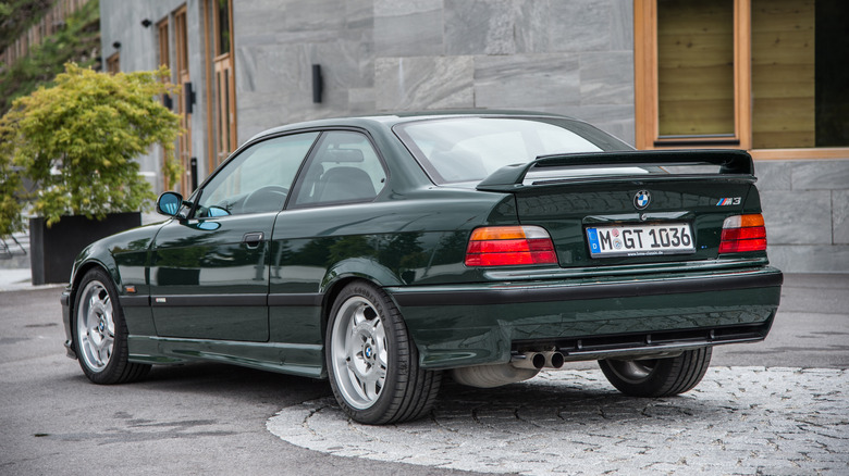 Rear 3/4 view of a green BMW M3 GT