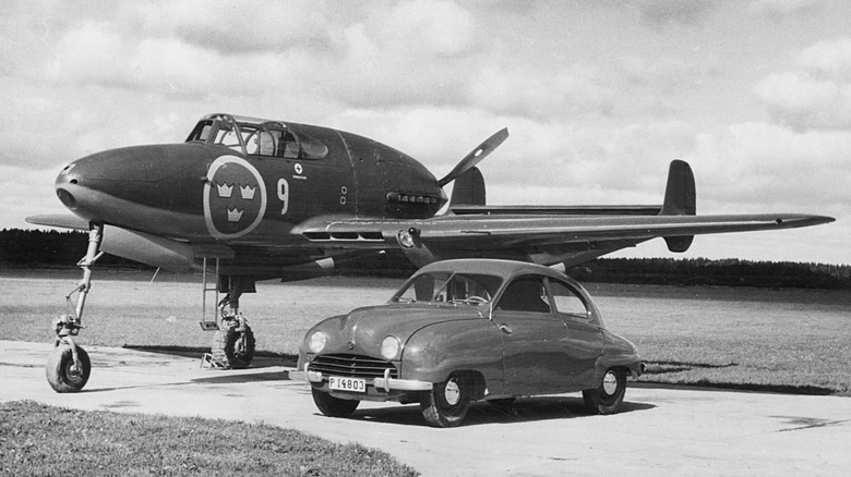 1949 Saab 92 with Saab 21 Jet Fighter plane. Creator: Unknown (Photo by National Motor Museum/Heritage Images via Getty Images)