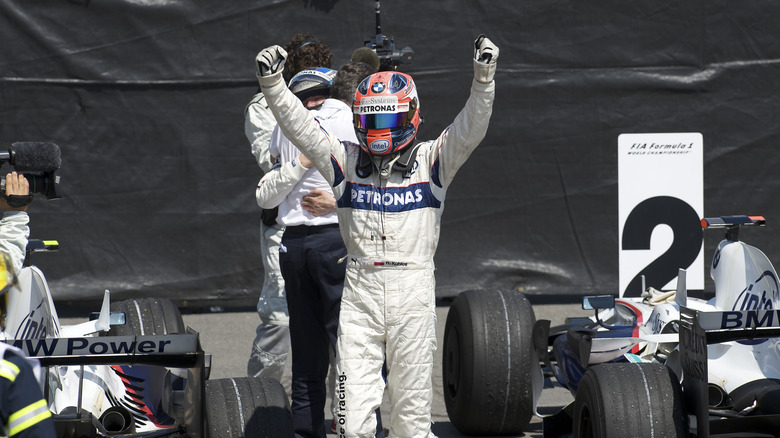 F1 BMW Sauber team race car driver Robert Kubica raises his arms in victory after winning the Formula One Grand Prix of Canada at the Gilles Villeneuve circuit in Montreal.