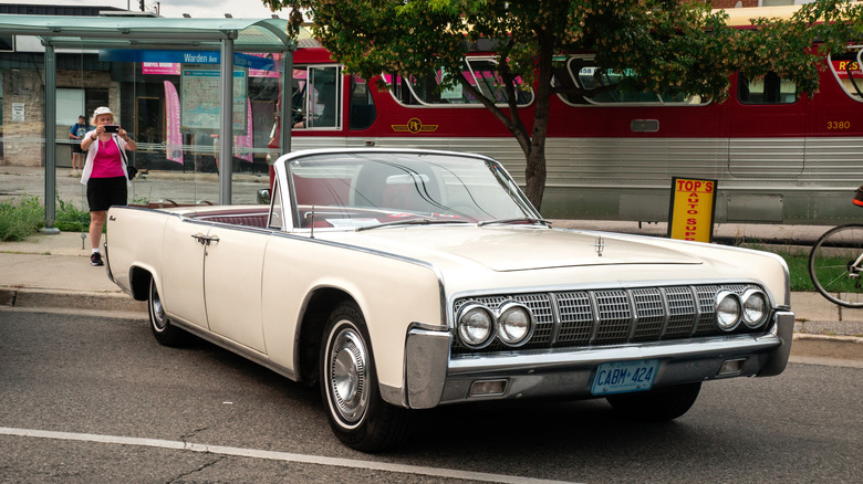 1964 Lincoln Continental 4-Door Convertible parked on the street
