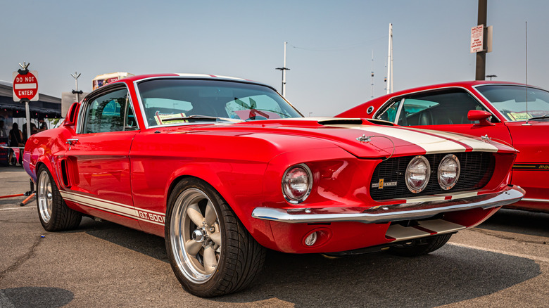 A bright red 1967 Ford Shelby GT500.
