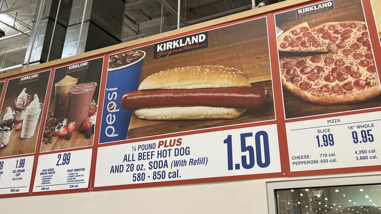 Close-up of signs listing prices at Costco food court, including the price for Costco's hot dog and fountain soda combination, Danville, California, July 3, 2022.