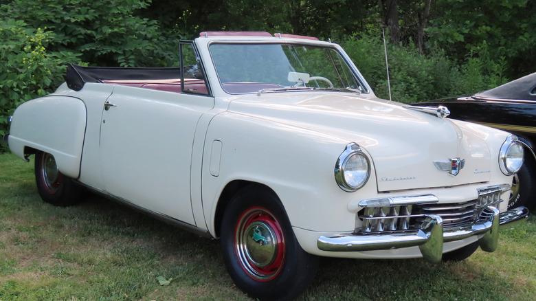 a white 1948 Studebaker Champion convertible