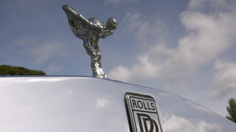 the hood ornament of a Rolls Royce