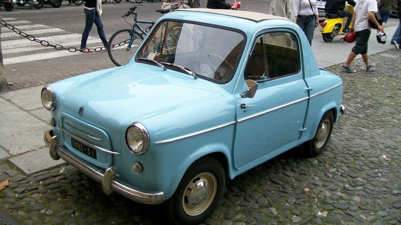 a tiny blue Vespa 400
