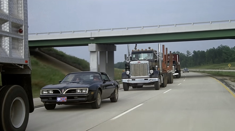 a scene from the film Smokey and the Bandit featuring the 1977 Pontiac Trans Am SE