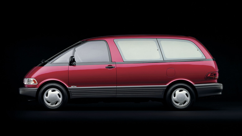 Side view of a red Toyota Previa