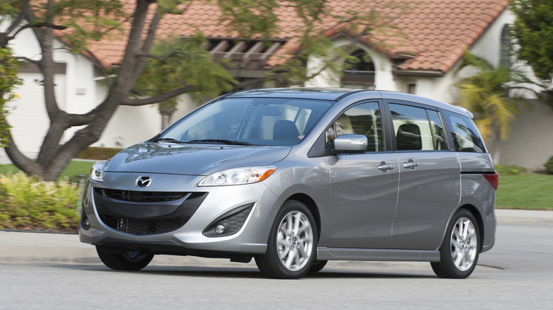 Front 3/4 view of a silver Mazda5