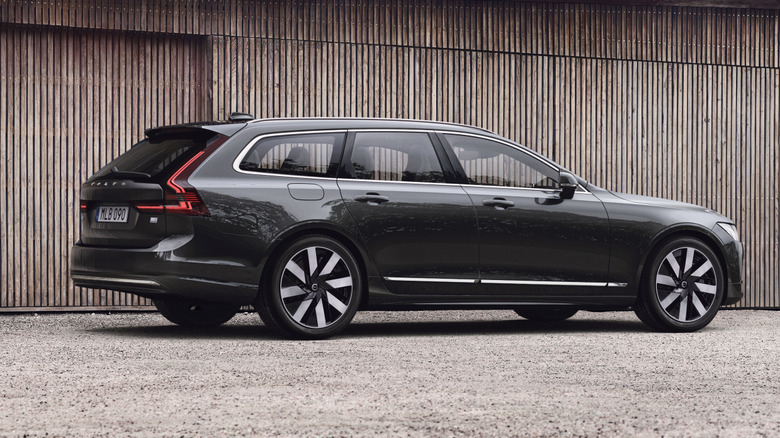 Rear 3/4 view of a gray Volvo V90